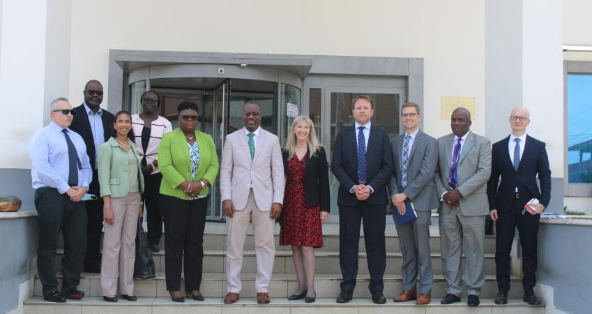 Gov't Tarlue flanked by USAID Director (r) and DG for Operations, Pearson. Photo Credit: CBL